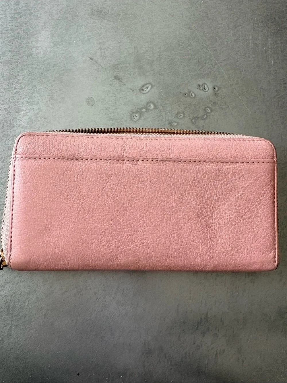 kate spade pink pebbled leather zip wallet with bow
